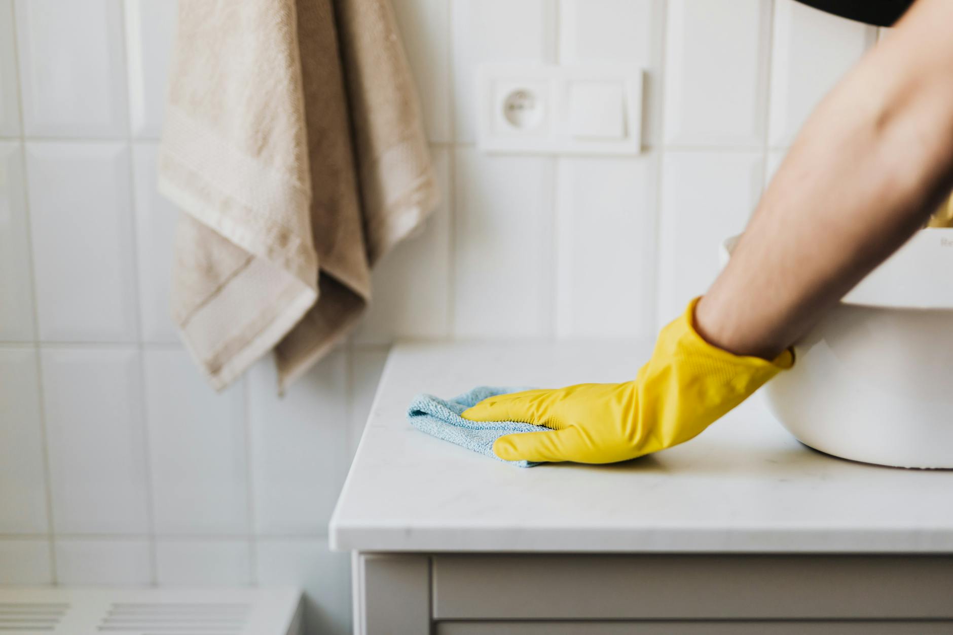Recurring Residential Cleaning Services 1 crop housewife cleaning surface near sink