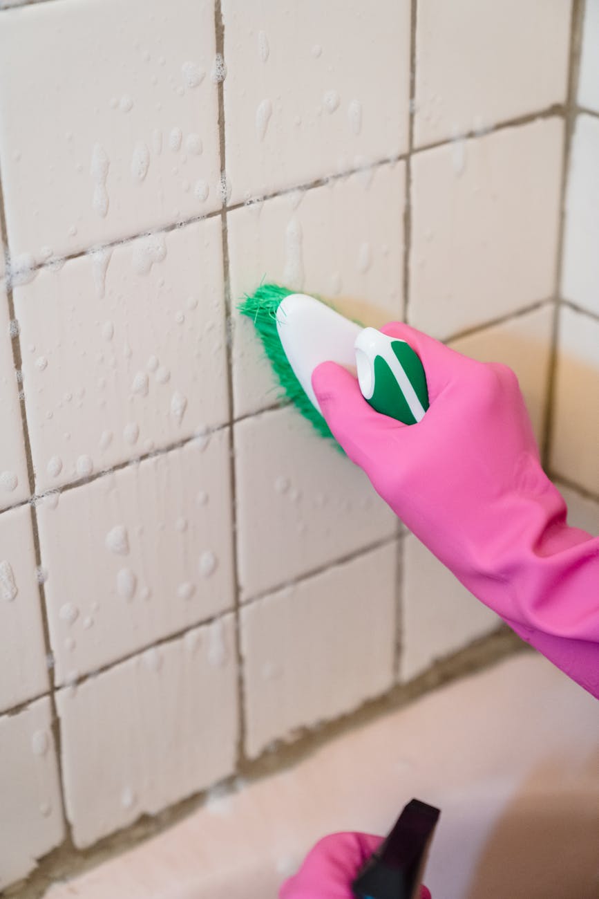 Professional Deep Cleaning for Your Home 1 close up of brushing the wall tiles